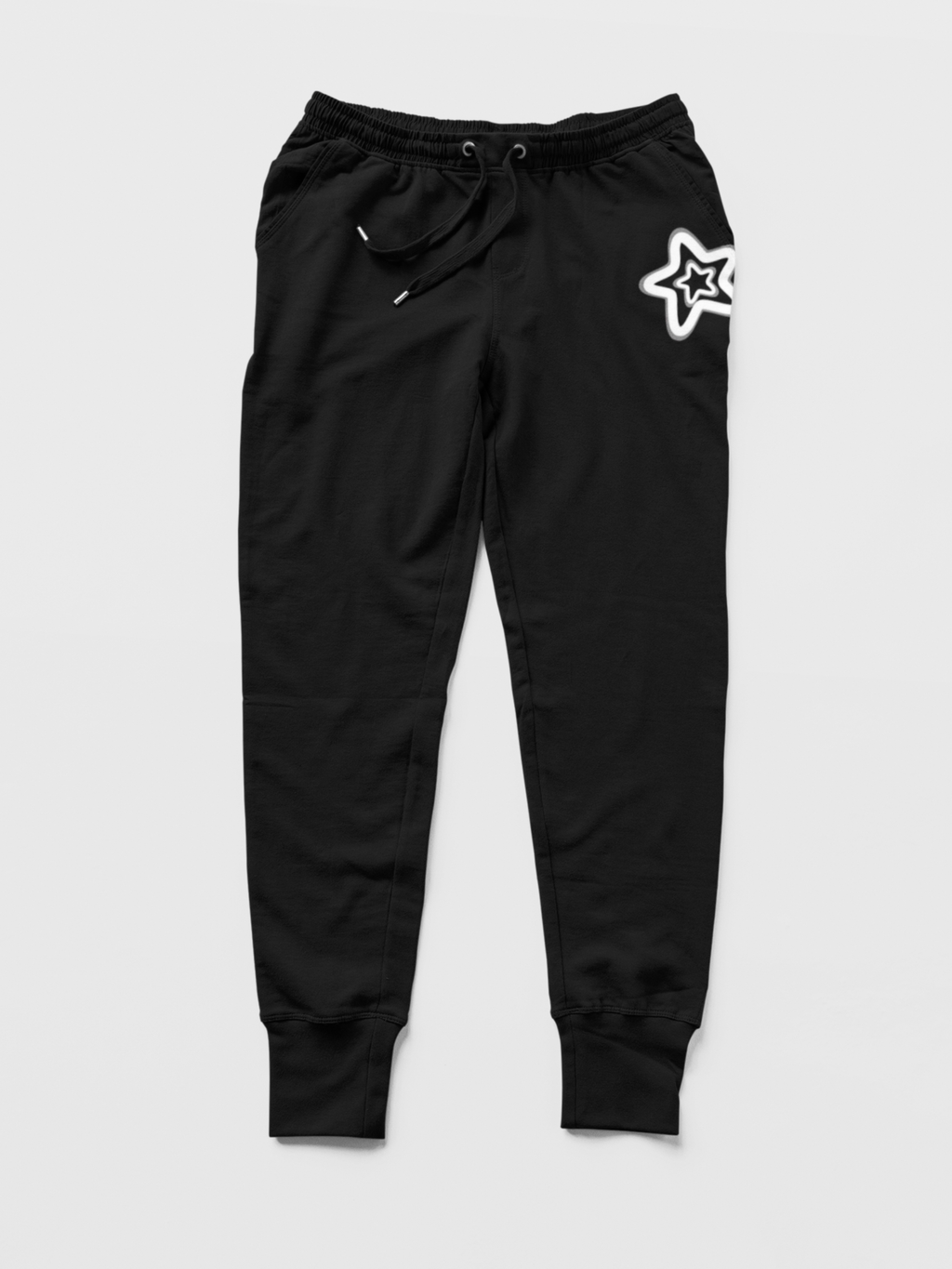 Black jogger pants with a white star logo on a light gray background