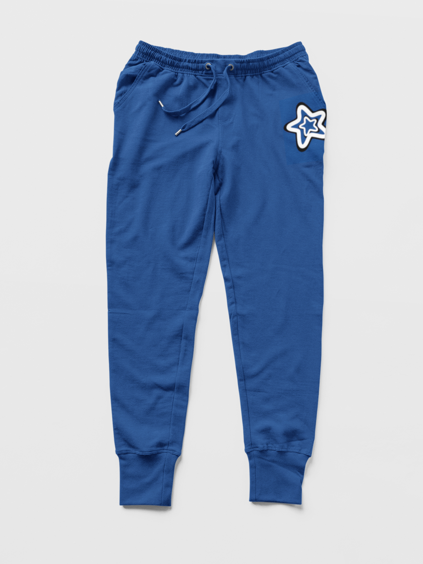 Blue jogger pants with a star design on a light gray background