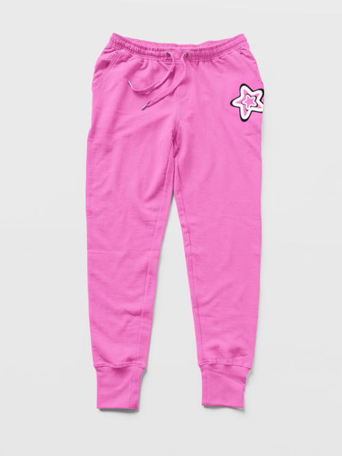 Pink sweatpants with a star design on a light gray background